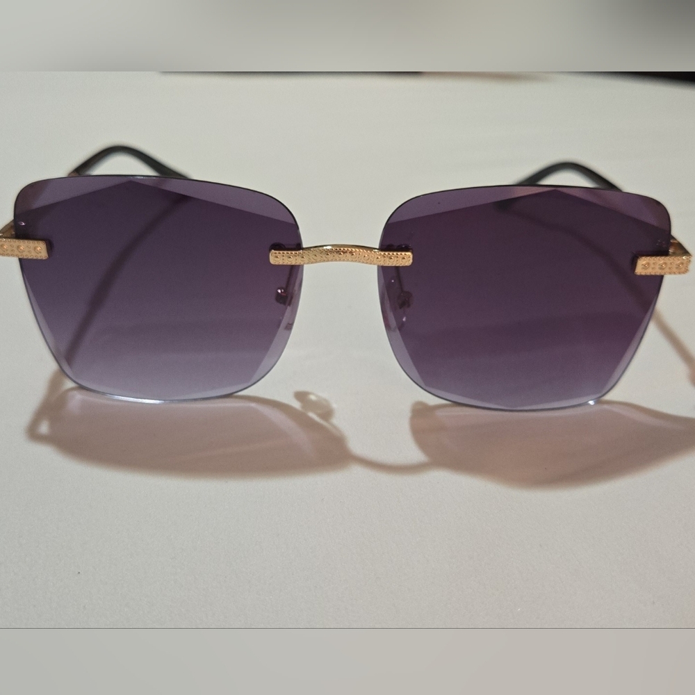 Elegant Purple Sunglasses with Gold Accents